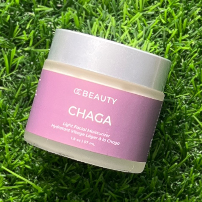 Jar of 'Beauty Chaga' cream on a grassy background