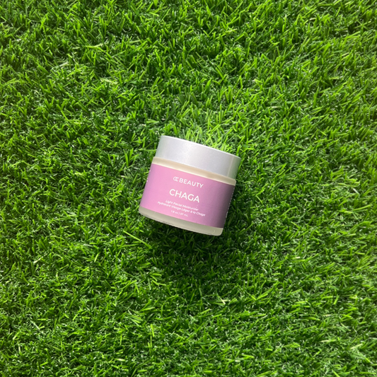 Jar of 'Beauty Chaga' cream on a grassy background